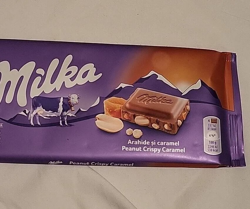 MILKA шоколад 90г молочный АРАХИС И ХРУСТ. КАРАМЕЛЬ